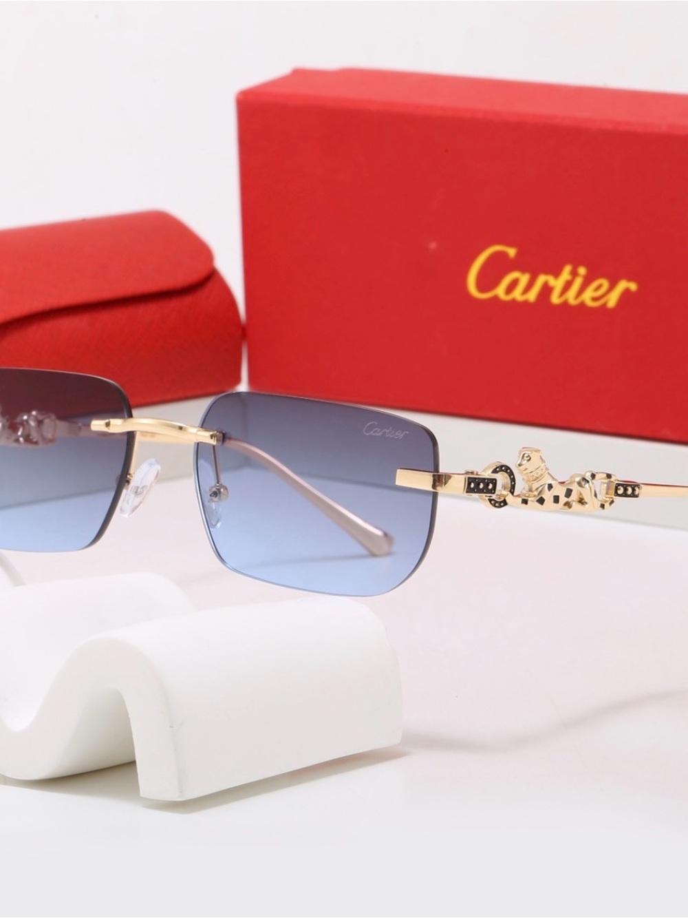 Cartier Women's Blue Gradient Rimless Sunglasses with Gold Panthère Temples